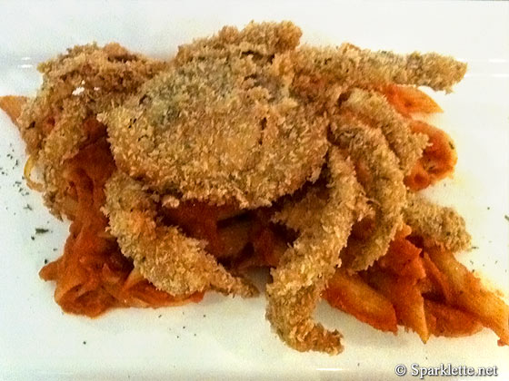 Penne pasta with soft shell crab in zesty tomato sauce
